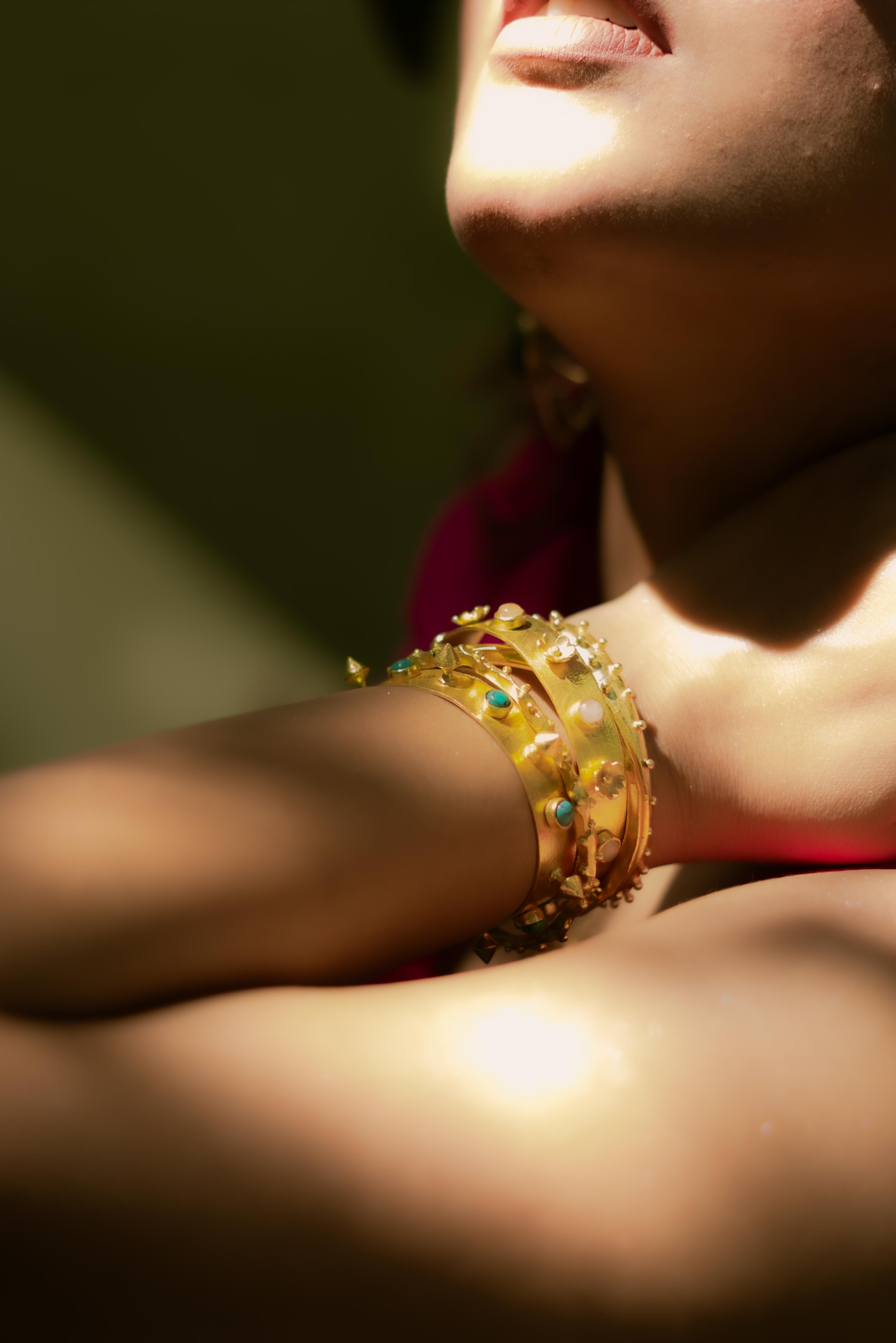 Gold plated stackable bangles set of 4 for women featuring turquoise and stone embellishments