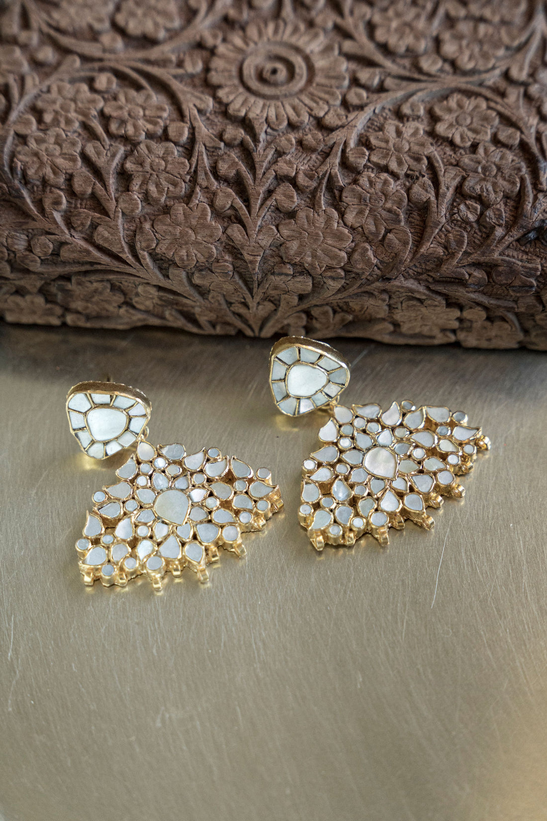 18k gold plated mother of pearl drop necklace and matching cluster earrings worn with gold bridal lehenga