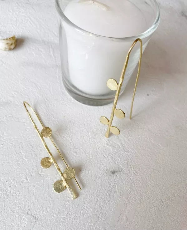 Stylist stringing Earrings