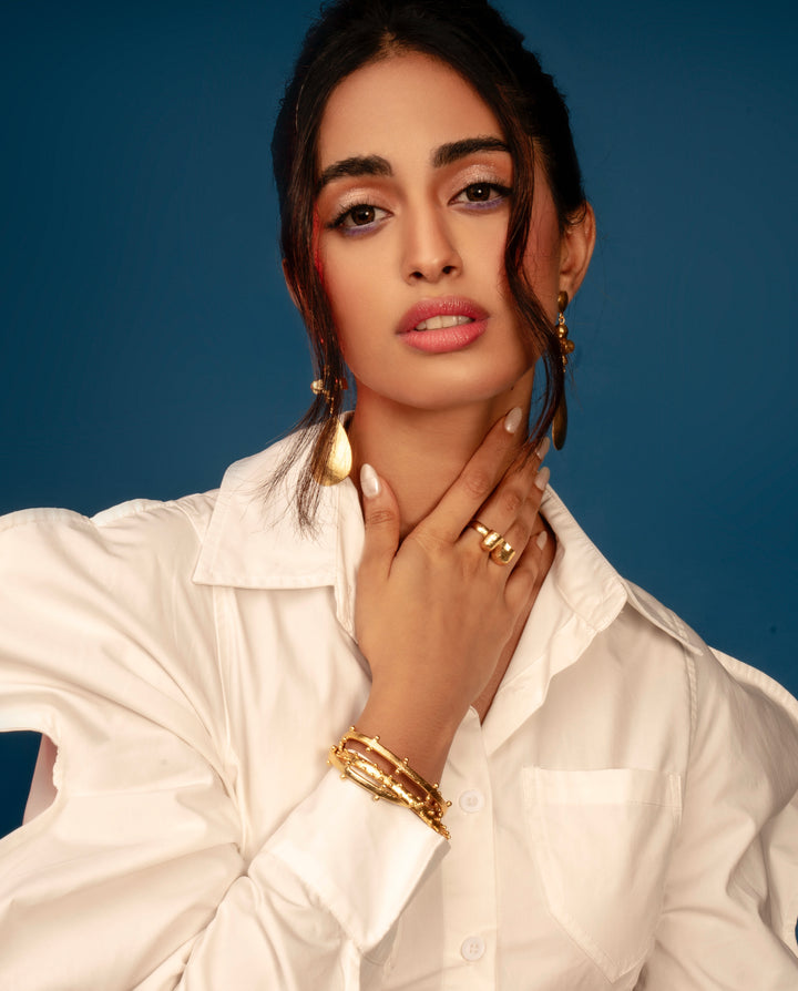 Handcrafted gold-plated statement ring featuring anti-tarnish brass construction. Discover lightweight heritage design for festive and casual looks.
