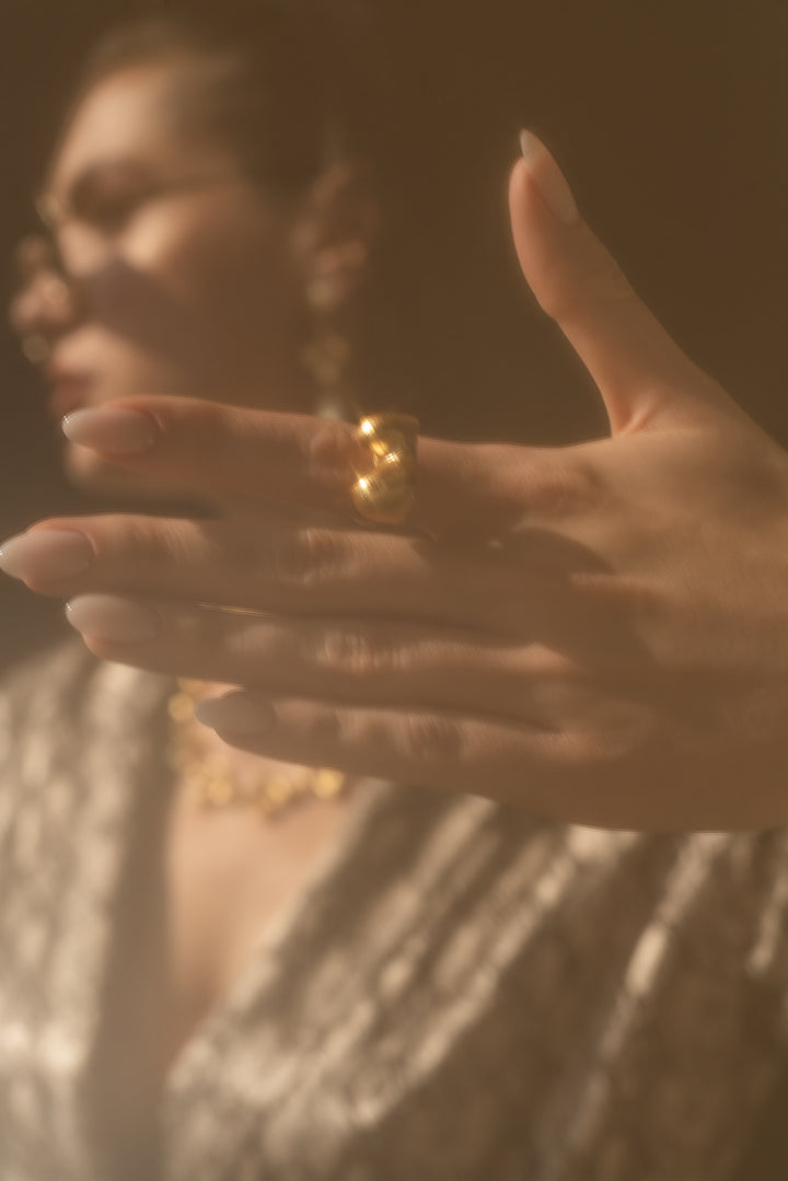 Elevate your look with the Glimsy Dot Ring by Baalajewels. A handcrafted gold-plated brass statement ring perfect for festive, party, and daily wear. Shop now!