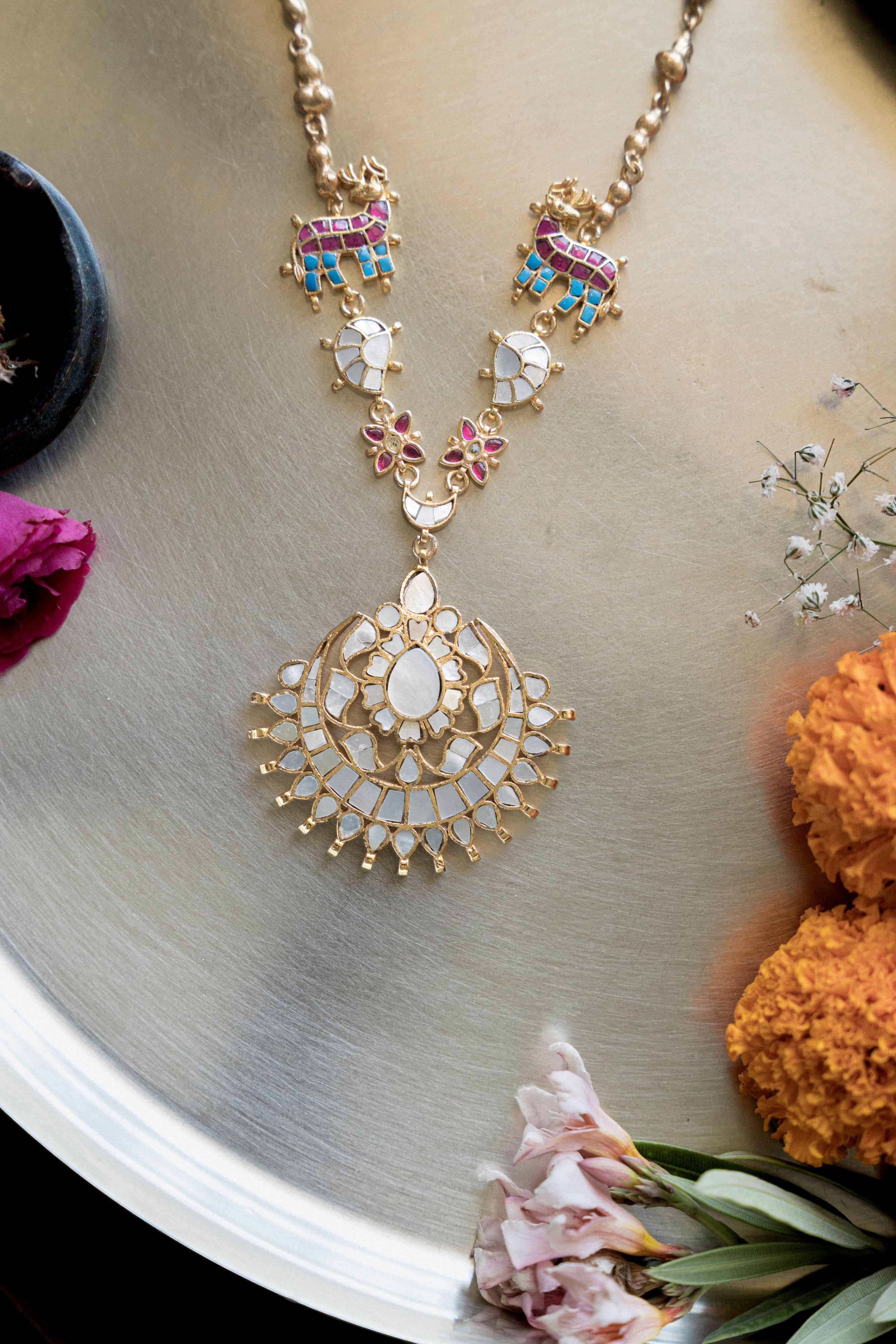 Gold plated MOP floral pendant necklace with intricate Kundan craftsmanship