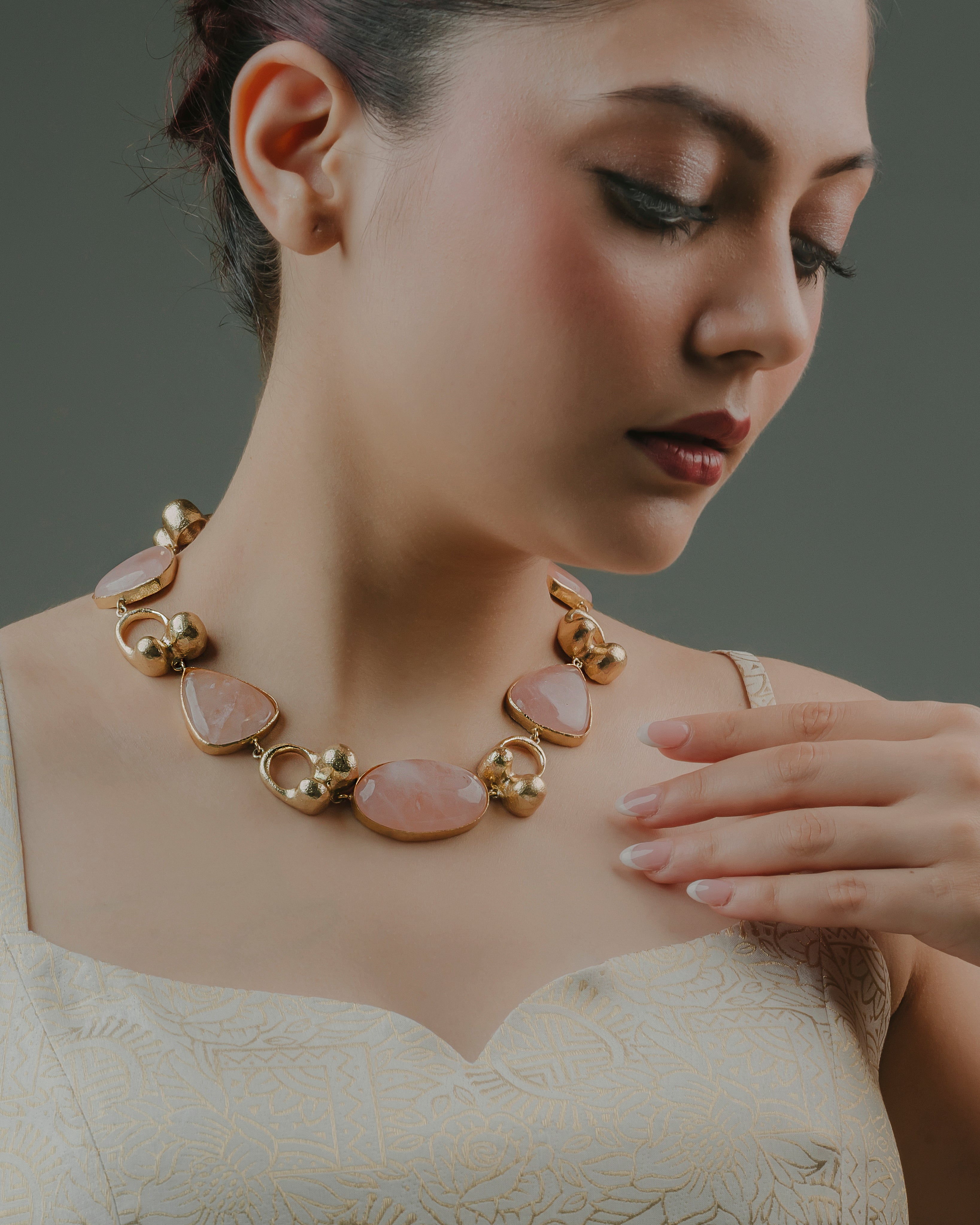 handcrafted gold plated rose quartz statement necklace for festive and ethnic functions