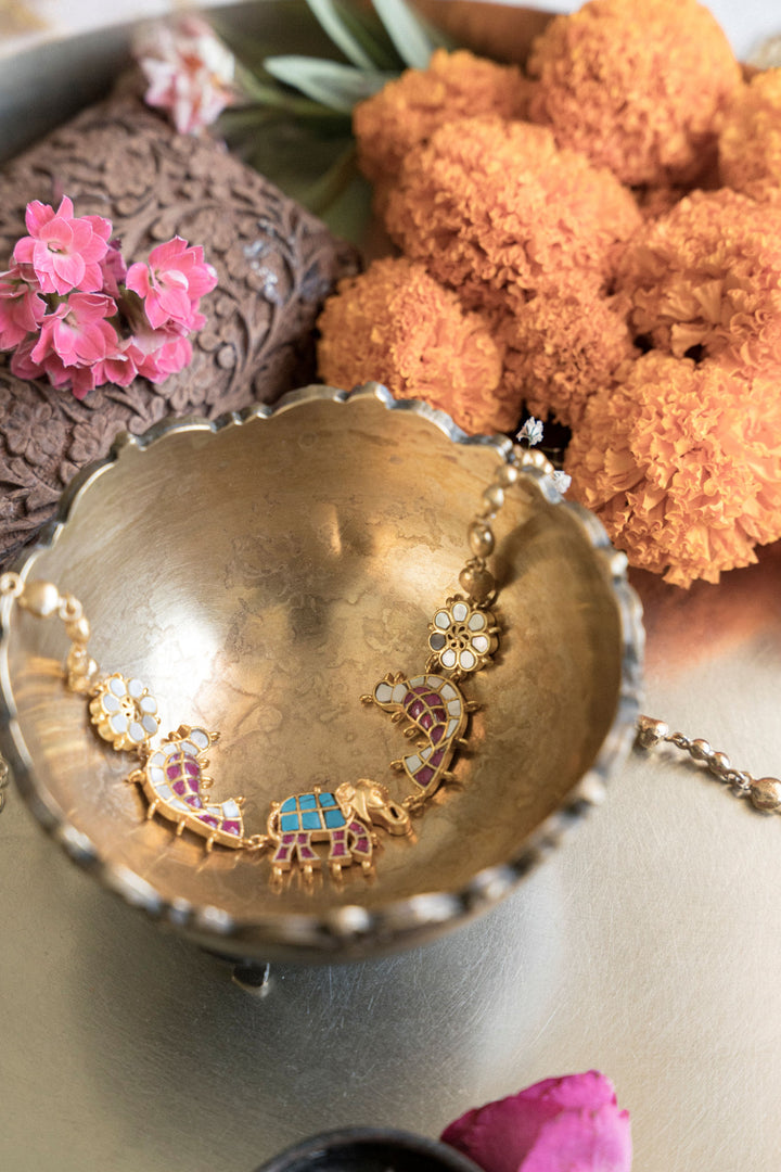 Gold-plated Gajraj Jadau Kundan necklace featuring traditional elephant motif and enamel work.