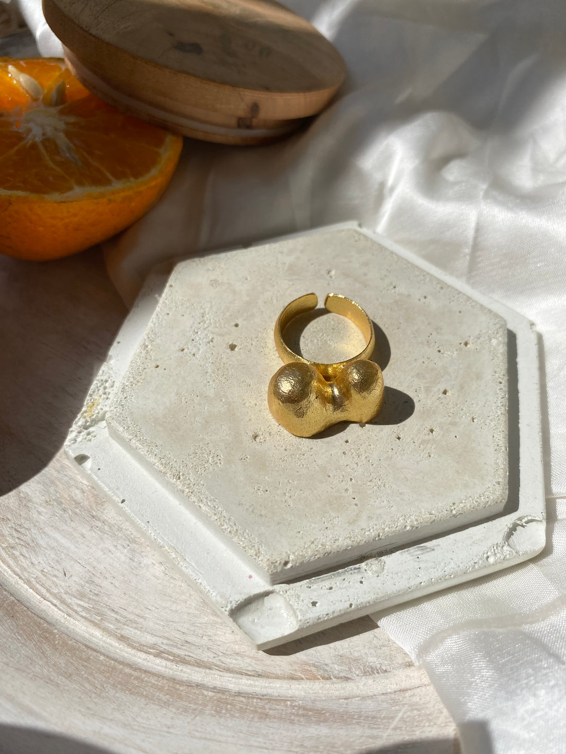 Discover the Glimsy Dot Ring, featuring allergy-free brass and premium gold plating. Handcrafted by Indian artisans for weddings, parties, and special occasions.