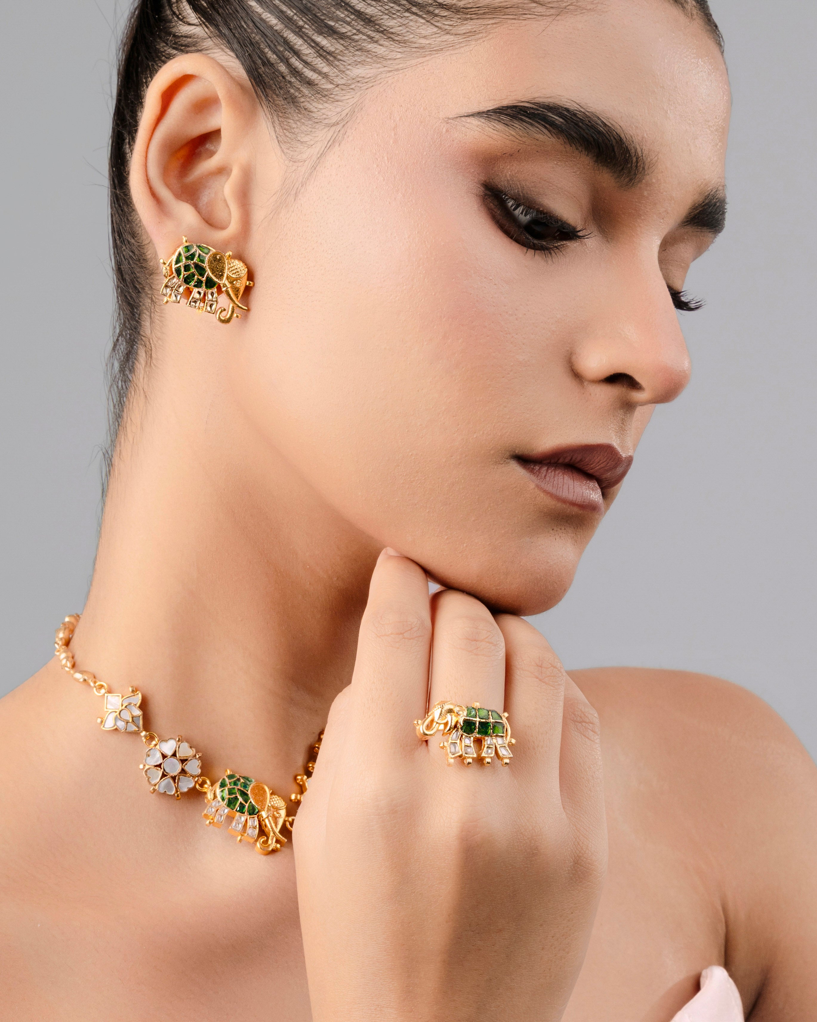 Buy a green Kundan Gaj stud for a wedding.
