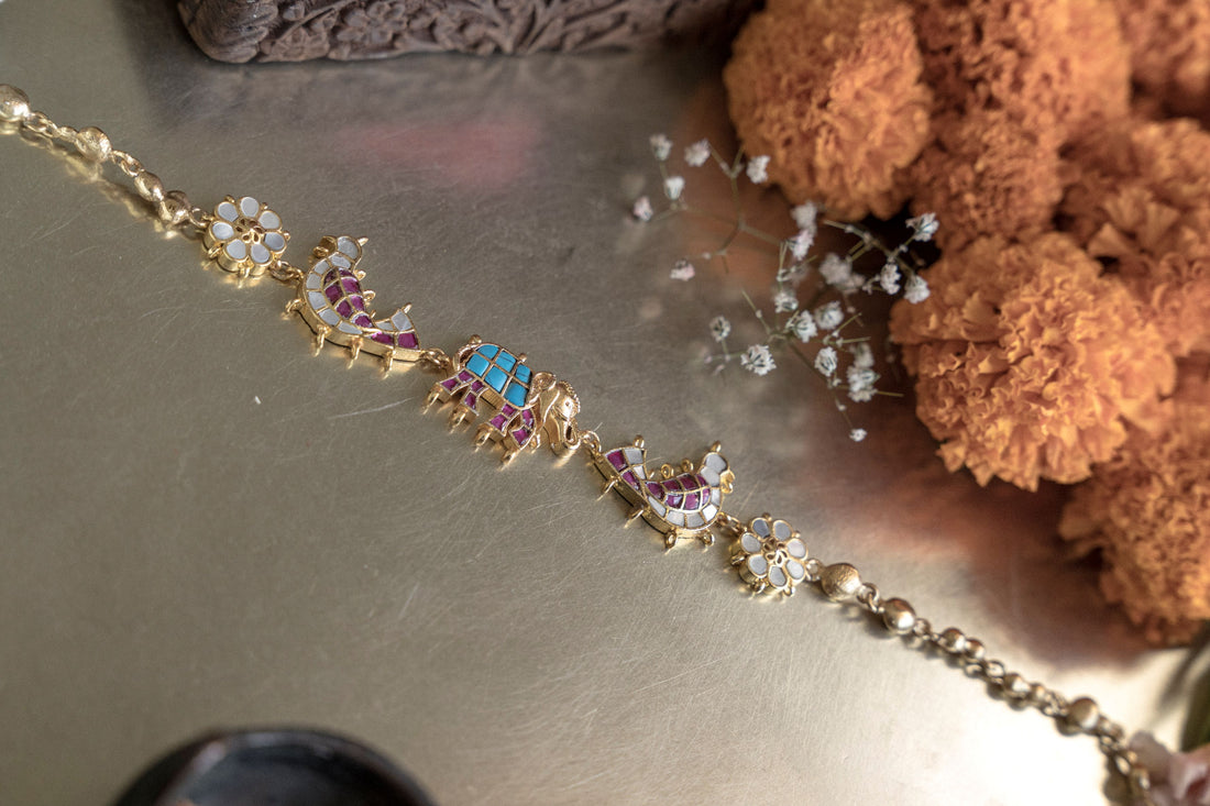 Close-up of traditional Indian Nawab crafts Jadau choker necklace with elephant motifs.