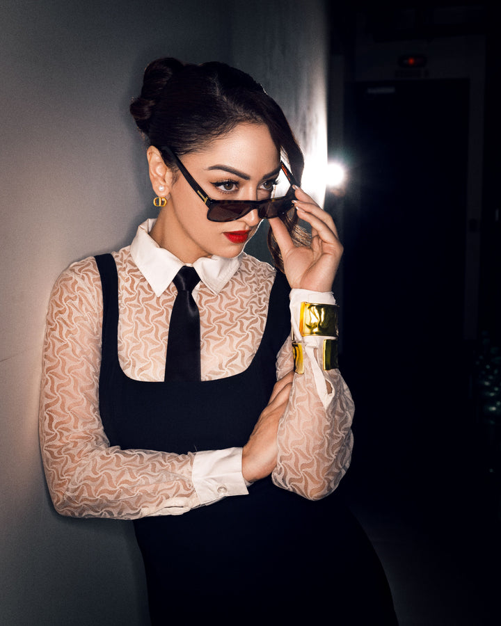 Sandeepa Dhar showcasing a plain gold statement kada bracelet for women.