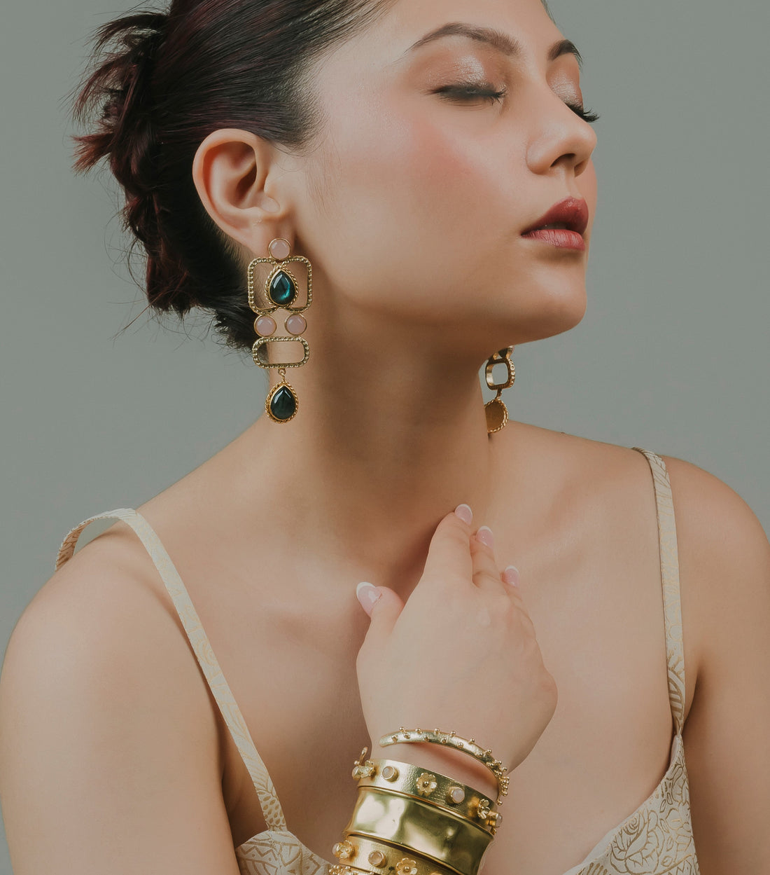square gold-finish ethnic drop earrings designed with traditional geometric brass craftsmanship.