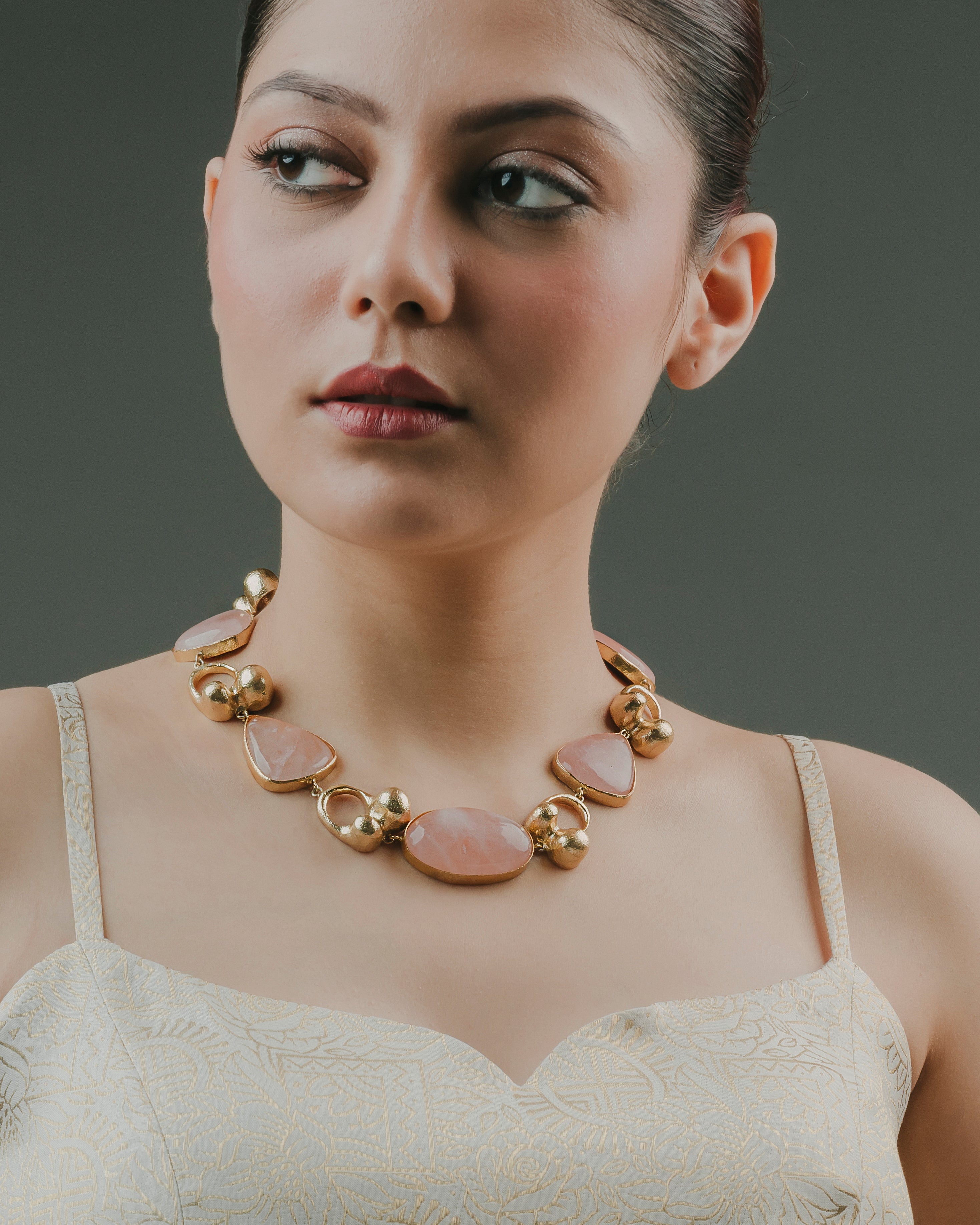 statement rose quartz gold choker necklace with modern Indian ethnic attire