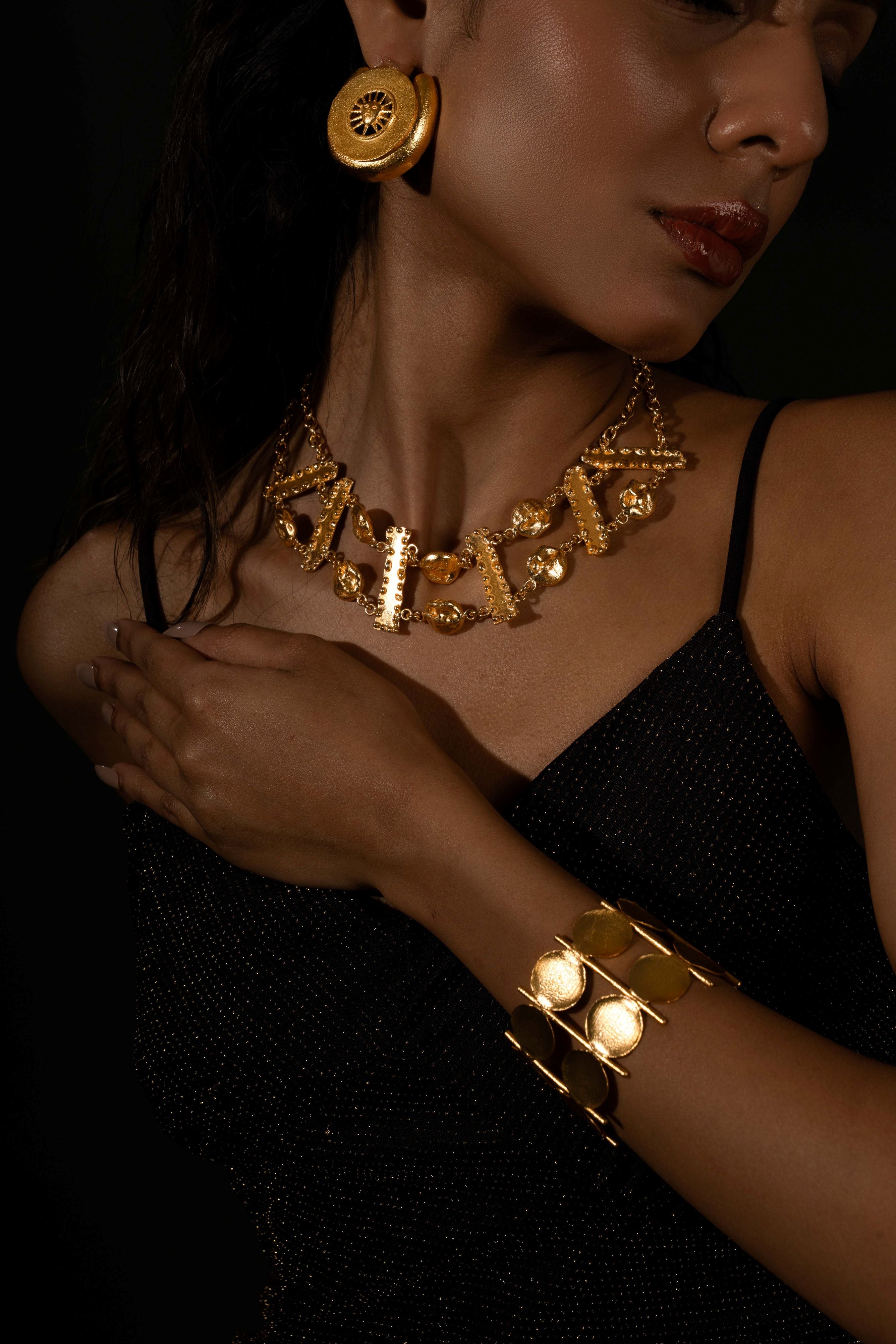 Gold-plated sun stud earring.  buy now