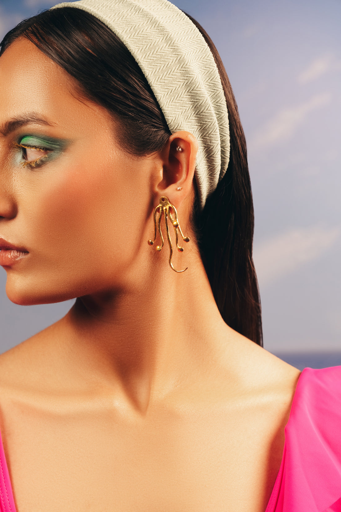Baalajewels gold octopus earrings from the summer jewelry collection.