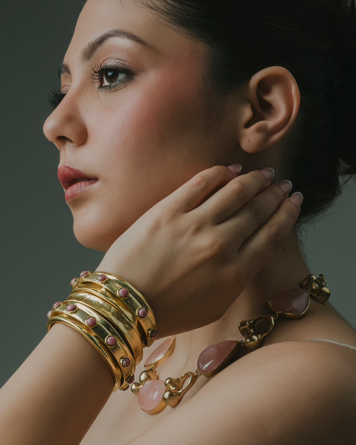 handcrafted openable gold bangle stack studded with rose quartz gemstones