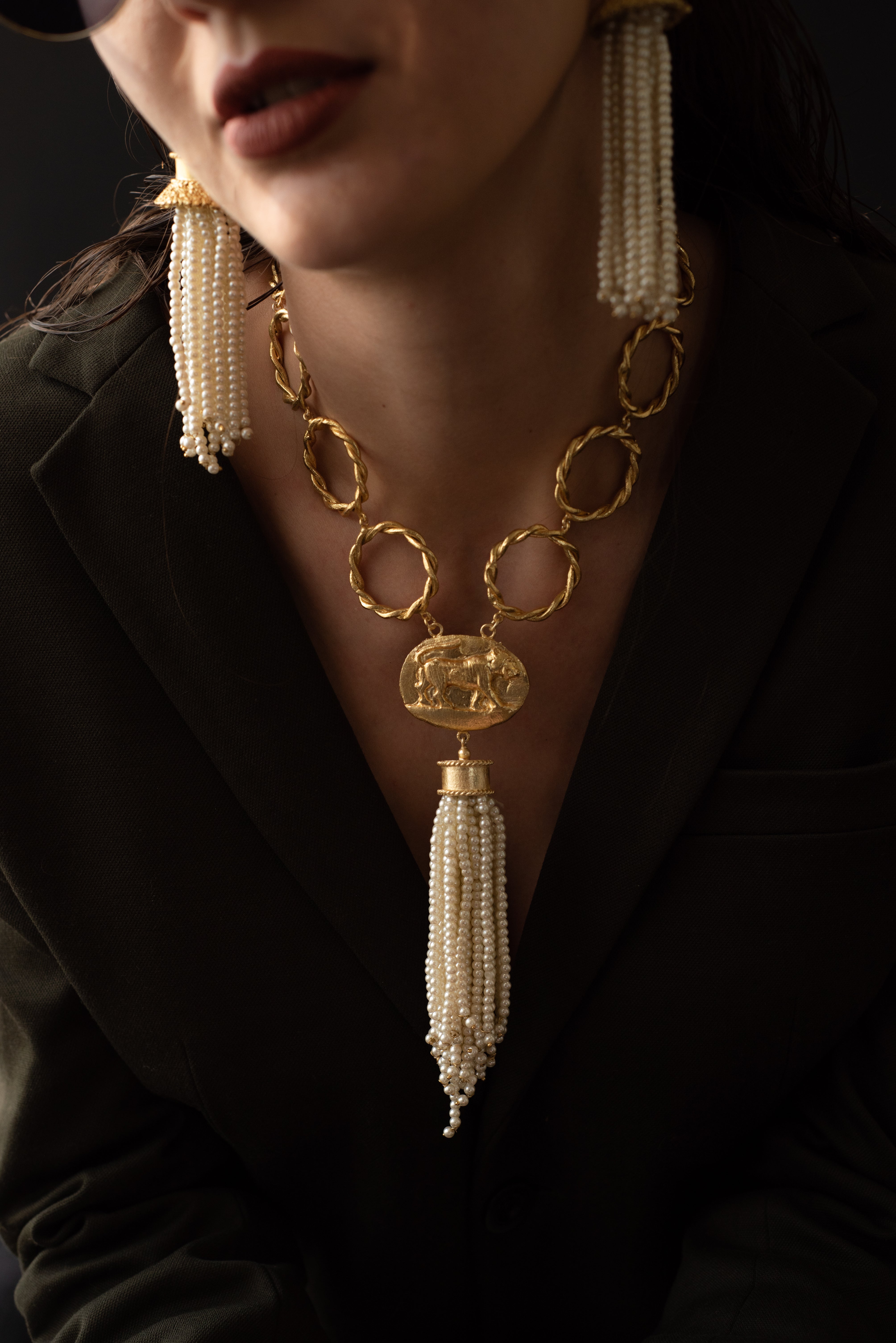 Ethically handcrafted artisan pearl necklace featuring a high-luster finish and durable gold plating.
