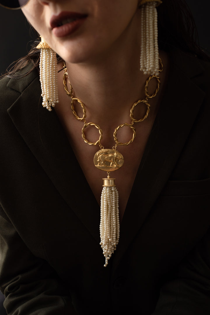 Ethically handcrafted artisan pearl necklace featuring a high-luster finish and durable gold plating.