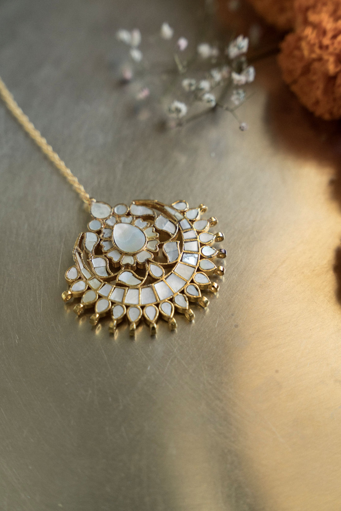 Traditional half-moon gold mangtika for wedding and festive ethnic wear