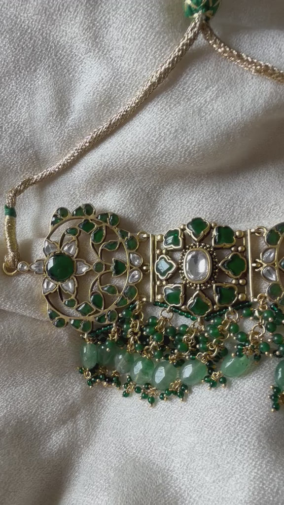 Royal Indian bridal green Kundan choker necklace set with detailed craftwork for weddings and festive wear.